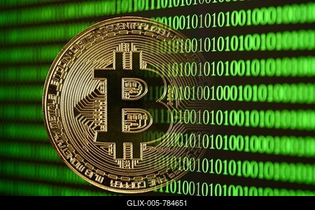 Symbol image digital currency, gold physical coin Bitcoin disappears in digital binary code-stock-foto