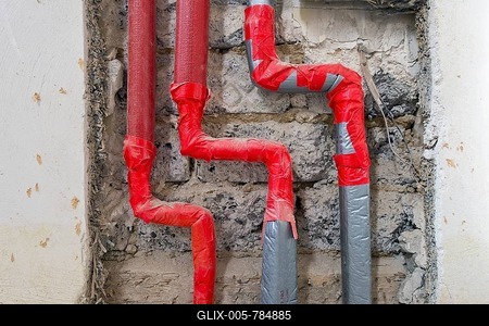 Newly installed heating and water pipes to be flush mounted in an old building, Stuttgart, Baden-Württemberg, Germany, Europe-stock-foto