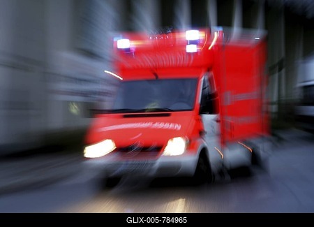 DEU Germany: Essen fire brigade. Ambulance on the way to an emergency with flashing blue lights.|-stock-foto