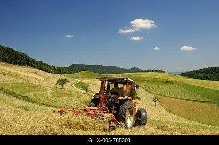 Tractor making hay on meadows in the Swiss Central Plateau, canton of Aargau, Switzerland, Europe-stock-foto