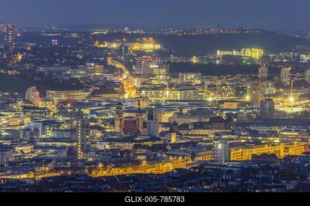City view at night, old town with collegiate church, castle square and main station, Stuttgart, Baden-Württemberg, Germany-stock-foto