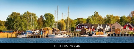 Boat docks with sailing boats and holiday homes in the harbour of Gager, Mönchgut peninsula, island of Rügen, Baltic Sea, Mecklenburg-Western Pomerania, Germany-stock-foto