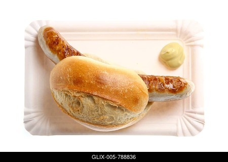 Fast food, grilled sausage in a bun with mustard-stock-foto