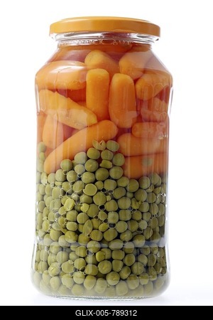Peas and carrots conserved in glass packaging-stock-foto