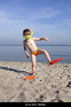 Young boy with diving goggles, snorkel and flippers, beach of Kuehlungsborn, Mecklenburg-Western Pomerania, Germany, Europe-stock-foto
