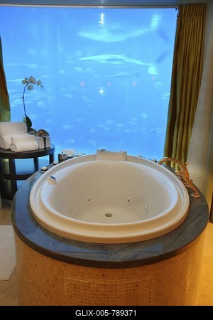 Underwater suite looking into the 11 million liter Ambassador Lagoon aquarium, in the Atlantis Hotel, The Palm, Dubai, United Arab Emirates-stock-foto