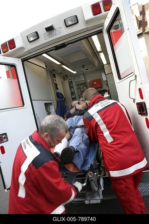DEU Germany : Rescue paramedics first aid after an accident with a man injured at his leg. ambulance fire service. Training situation. |-stock-foto