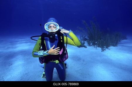 Underwater sign language " has problems with my ear ", the Caribbean.-stock-foto