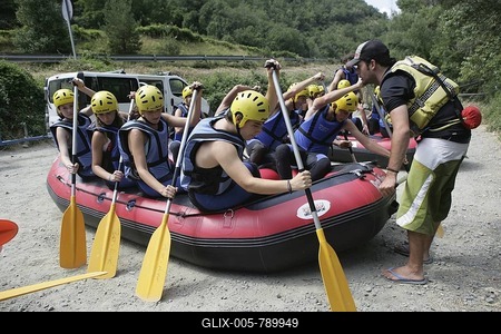 Practicing on shore, whitewater rafting on a mountain river in the Pyrenees near Rialp, Catalonia, Spain, Europe-stock-foto