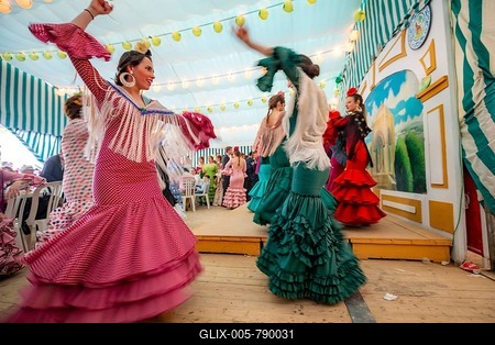 Young woman dancing Sevillano, Spanish woman with flamenco dresses in colourful marquee, Casetas, Feria de Abril, Sevilla, Andalusia, Spain-stock-foto