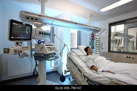 Patient lying in a special bed, being given artificial respiration through the nose, intensive care unit, hospital-stock-foto