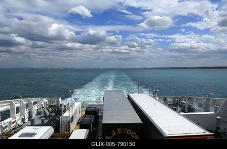 Trucks and cars at the rear of the car ferry Seafrance on the crossing from Calais-Dover, in the rear the coast of France, Europe-stock-foto