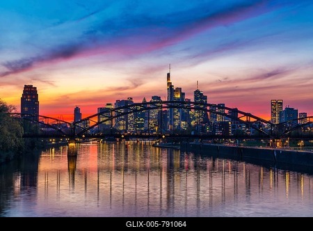 Skyline of Frankfurt in front of sunset with illuminated skyscrapers and reflections in the Main, Frankfurt am Main, Hesse, Germany-stock-foto