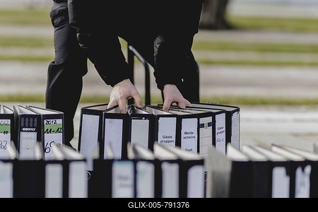 Files are cleared away after a protest action by the German Confederation of Skilled Crafts in front of the Federal Chancellery in Berlin, 26 February 2024. The German Confederation of Skilled Crafts demonstrates against the economic policy of the federal government as well as the high level of bureaucracy and the improvement of location conditions-stock-foto