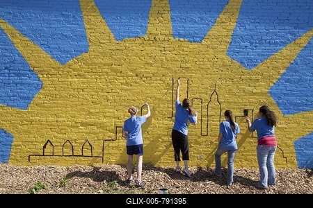 Volunteers in the Summer in the City program, a community improvement project, painting a mural on a building, Detroit, Michigan, USA-stock-foto