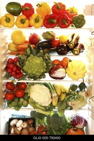Fridge filled with different kinds of vegetables and fruit-stock-foto