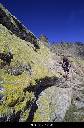 Female hiker walking on the hiking trail GR20 Corsica France-stock-foto