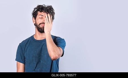 Tired and desperate man covering his face with his hand palm, Concept of a bored and tired man-stock-foto