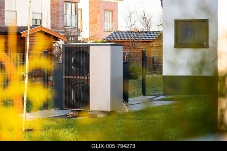 A heat pump in front of an apartment block in Düsseldorf, Germany-stock-foto