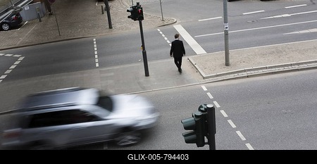 Pedestrian and car at traffic lights in the city, Hamburg, Germany-stock-foto