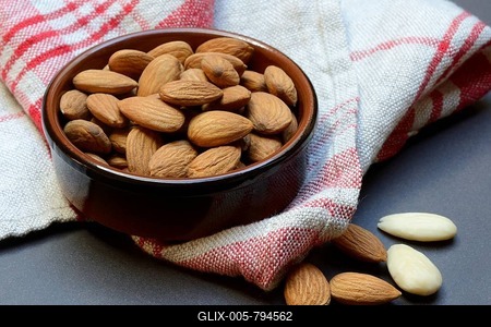 Almonds in small bowls (Prunus dulcis)-stock-foto