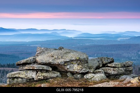 Sunrise on the Brocken, view over hills and forests with valley fog, in front the witch altar, Harz National Park, Saxony-Anhalt, Germany-stock-foto