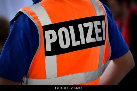 Inscription Police on protective vest, back view, Switzerland-stock-foto