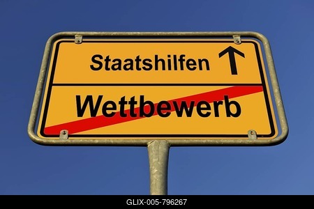 Town sign, city limits, Staatshilfen and Wettbewerb, German for state aid and competition, symbolic image for contradiction between competition and state aid-stock-foto