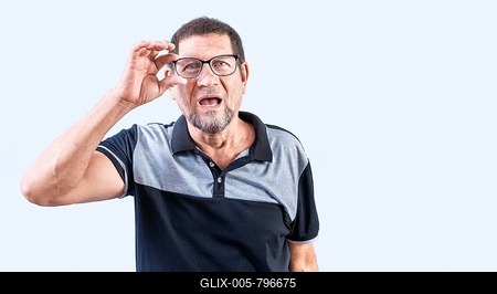 Amazed senior man taking off glasses isolated. Surprised senior man taking off glasses looking at camera-stock-foto