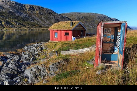 Rorbuer with toilet (outhouse) on the fjord off Bergen, summer, Nordkinn Peninsula, Finnmark, Norway-stock-foto