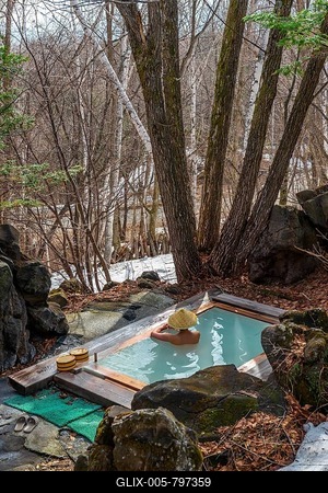 Woman bathing in an onsen, hot thermal spring of a guesthouse, Matsumoto, Japan-stock-foto