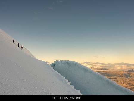 Climber above a crevasse on the steep glacier of the Cayambe volcano, Cayambe, Pichincha province, Ecuador-stock-foto