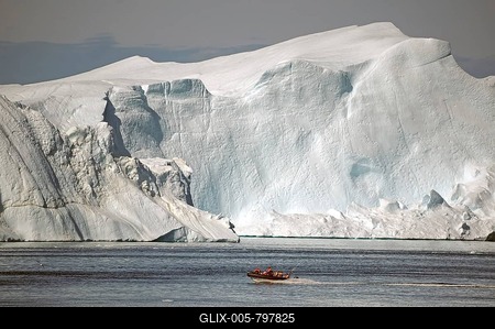 Boat with passengers in front of huge iceberg, Disko Bay, Sermermuit, Ilulissat, Greenland, Denmark-stock-foto