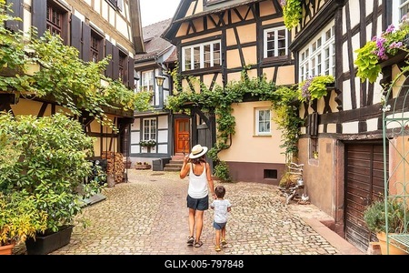 Mother and son in the medieval village in the old town of Gengenbach in the Black Forest, Germany, family vacation concept-stock-foto