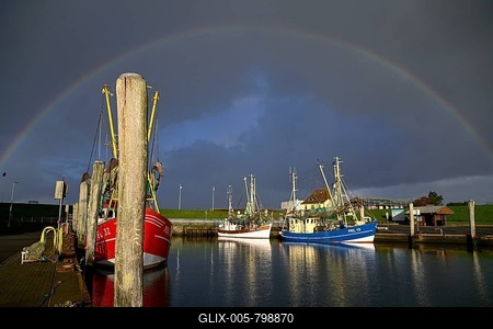 Fishing boats in the harbour of Tammensiel, rainbow, Pellworm Island, Schleswig-Holstein Wadden Sea National Park, North Frisia, Germany-stock-foto
