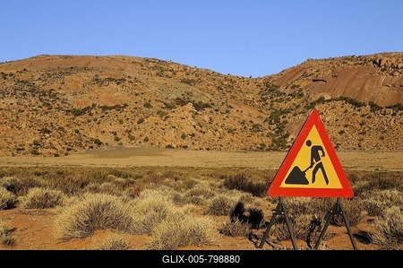 Warning sign for a construction site in the desert, Goegap Nature Reserve, Namaqualand, South Africa, Africa-stock-foto