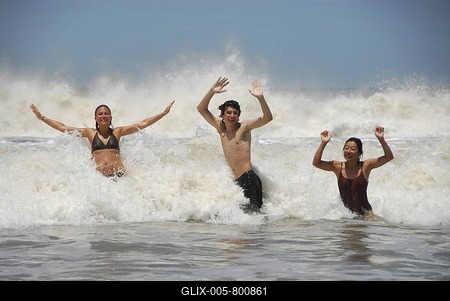 Young people having a bath at Pinamar beach, Buenos Aires province, Argentina-stock-foto