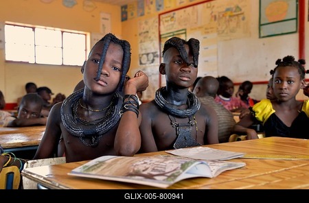Girls, Himba pupils, sitting in a classroom at the Omohanga Primary School, Himba school, Omohanga, Kaokoland, Kunene, Namibia-stock-foto