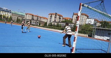 Children playing football on a football field in Berlin-Mitte, Berlin, Germany, Europe-stock-foto