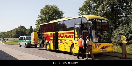 Police checking a coach on a motorway car park, Bavaria, Germany-stock-foto