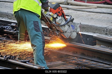 Worker with angle grinder cutting tram rails, Prague, Czech Republic, Europe, OeffentlicherGrund-stock-foto