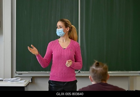 Teacher with face mask, Corona crisis, Baden-Württemberg, Germany-stock-foto