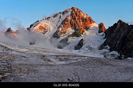 Aiguille du Chardonnet peak in fog over the glacier Glacier du Tour, evening light, Chamonix, Savoy, France-stock-foto