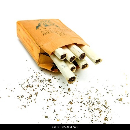 Old pack of Gauloises, typical french cigarettes on a white background, cutout, France-stock-foto