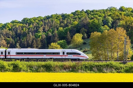 InterCityExpress ICE travelling across the Swabian Alb. Idyllic landscape in spring. Lonsee, Baden-Württemberg, Germany-stock-foto