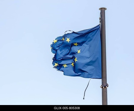 Torn European flag fluttering in the wind at the flagpole, symbolic image of Europe in crisis, Germany-stock-foto
