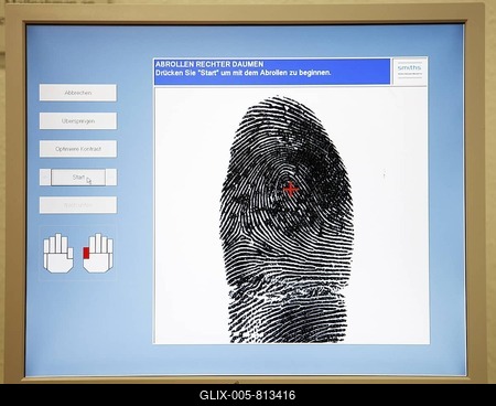 Fingerprints and handprints being recorded by digital scanner, physical identification of a suspect in a criminal investigation by the Criminal Investigation Department, re-enacted scene-stock-foto