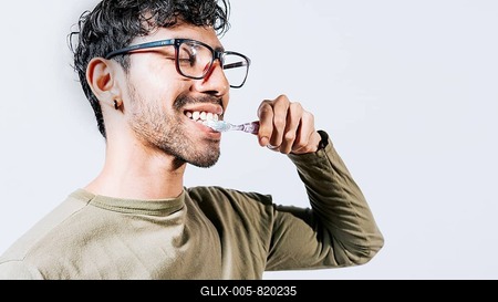 Man brushing his teeth isolated, Face of handsome man brushing his teeth with copy space. Tooth care and brushing concept. Face of person brushing teeth isolated with copy space-stock-foto