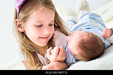 Girl and a baby, 1 month-stock-foto