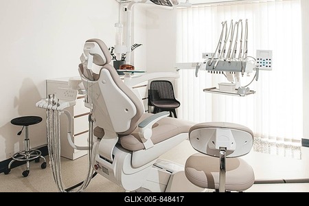 Modern dental clinic interior with equipment and patient chair ready for treatment-stock-foto